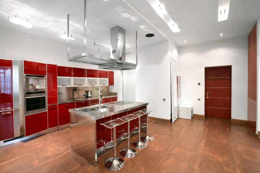 red-cabinet-kitchen-with-stainless-steel-countertops-and-breakfast-bar-island