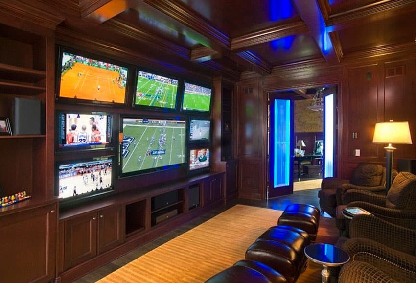Sports watching man cave with multiple tv monitors