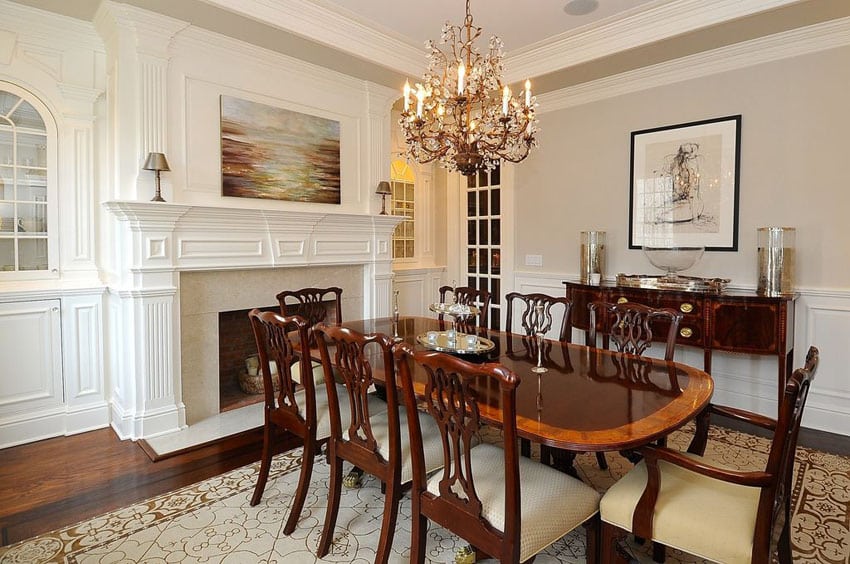 Traditional dining room with fireplace and chandelier