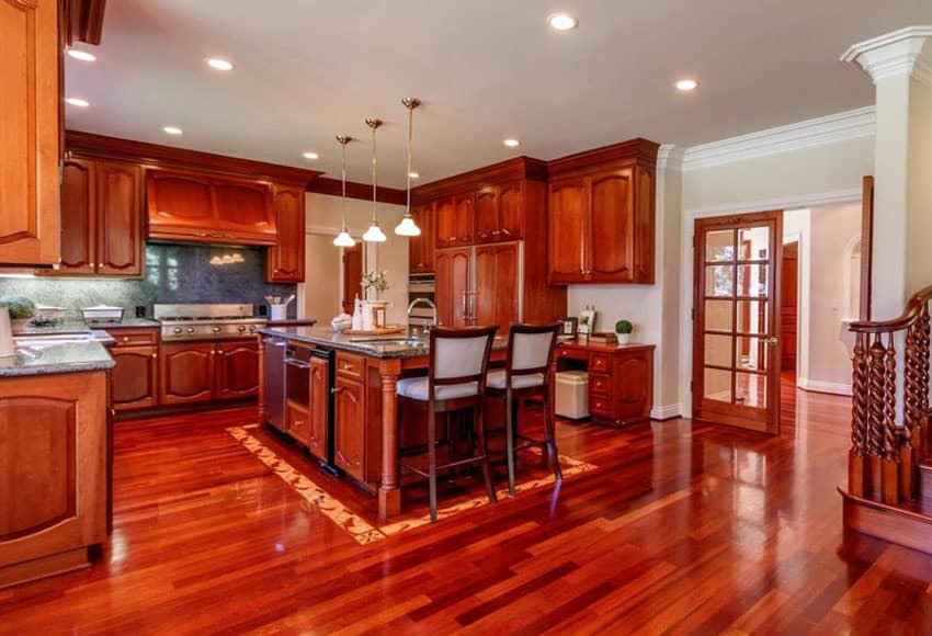 u-shaped-kitchen-with-brazillian-chery-floors-and-cabinets
