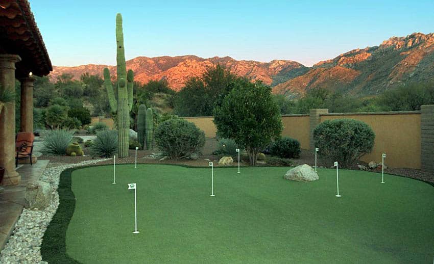 Golf practice area with mountain views