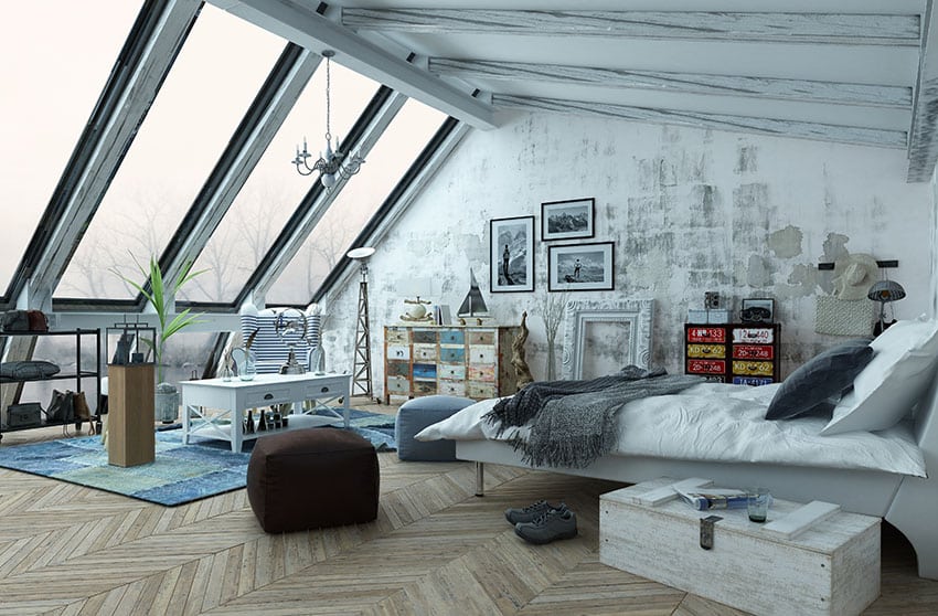 Bedroom loft with large slanted wall of windows