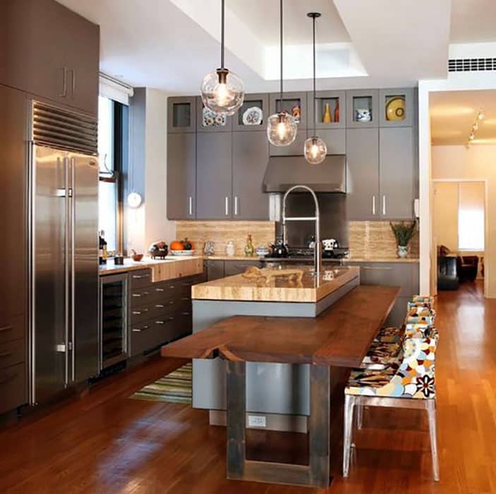 Dark cabinet modern kitchen with wood breakfast bar island and maple wood flooring