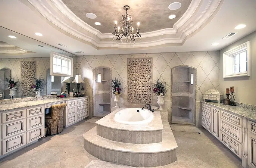 Expansive master bathroom with central enclosed tub with roman style faucet