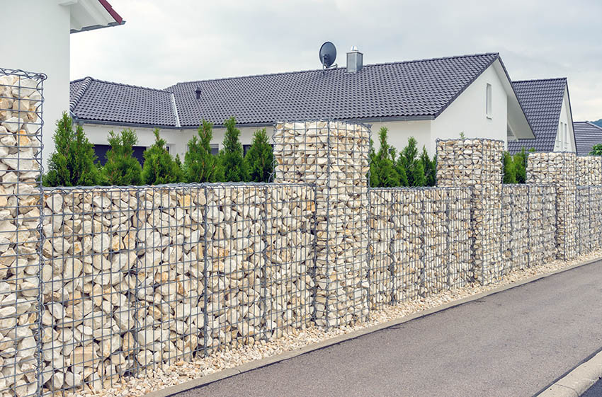 DIY gabion wall with sandstone rock filler