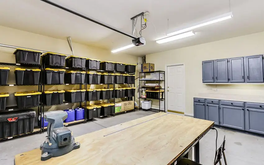 Garage with wall shelving and storage bins