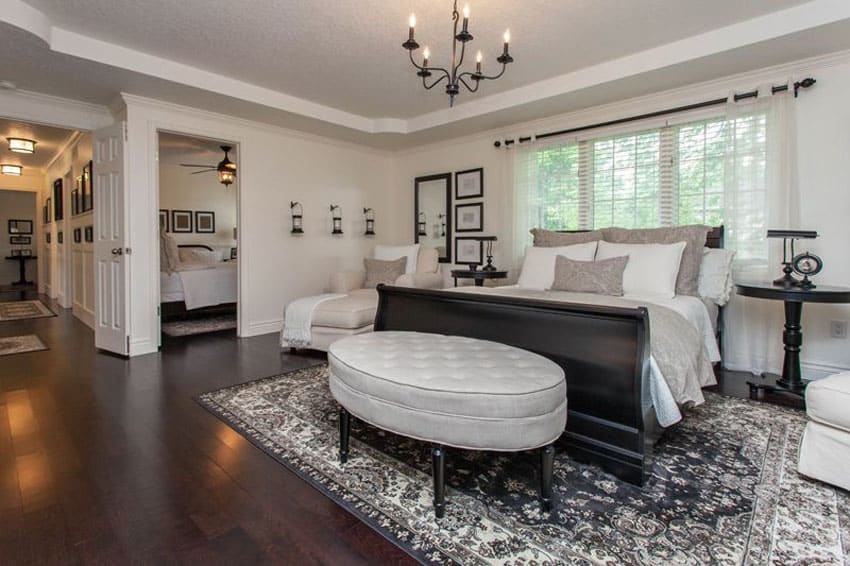 High-end bedroom with maple floors and sleigh bed