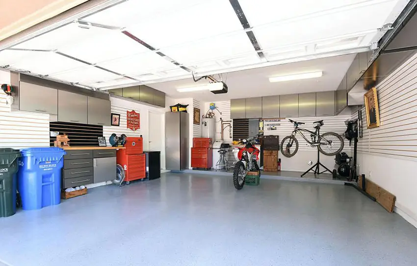 Remodeled garage with tool boxes and cabinets