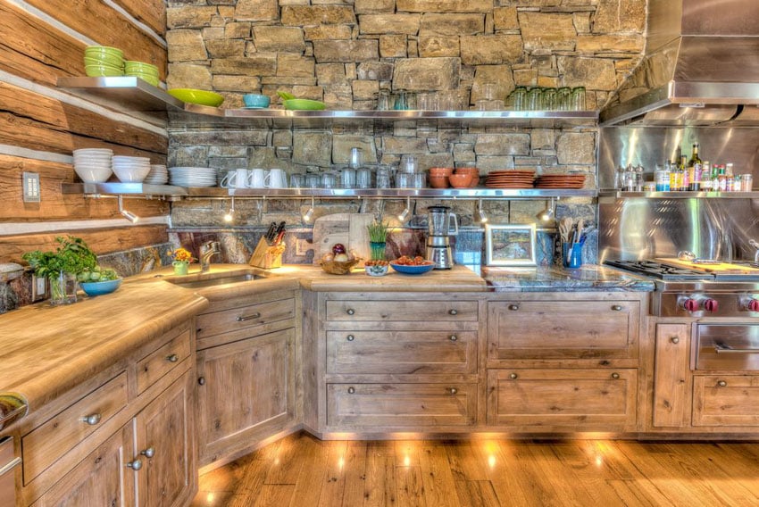 Rustic kitchen with solid wood cabinets, wood counter and stone back splash