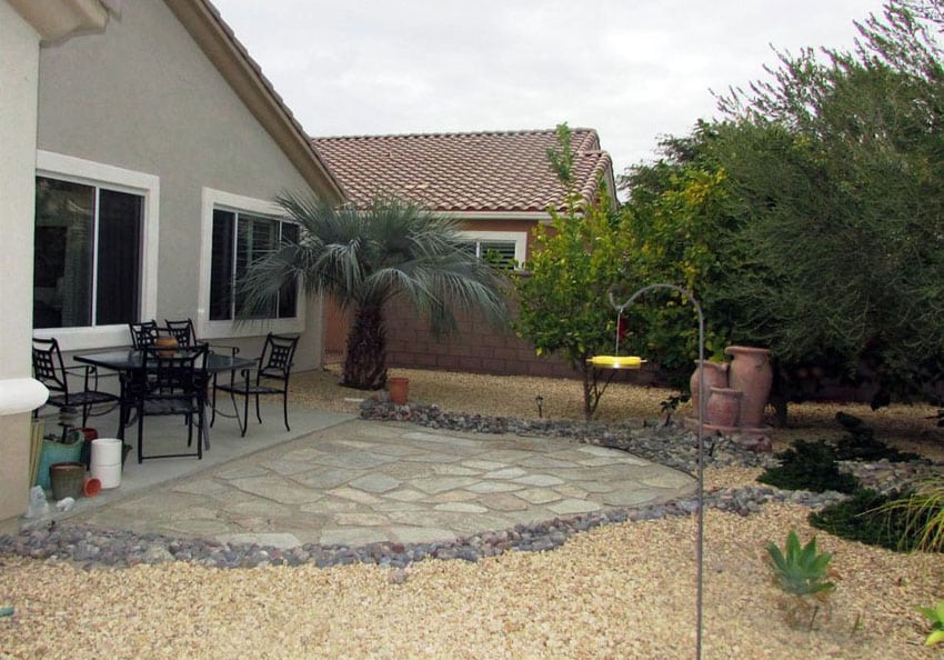 Backyard patio with irregular stones 