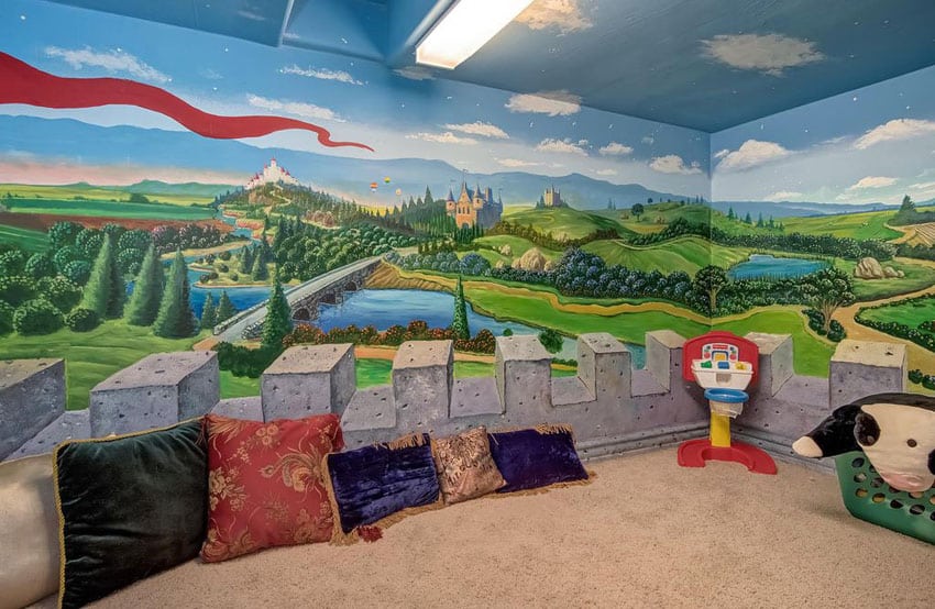 Basement kids playroom with art wall mural, painted ceiling and carpet
