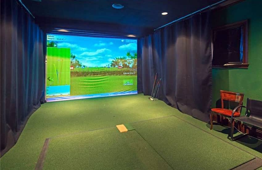 Room with virtual golf practice driving range