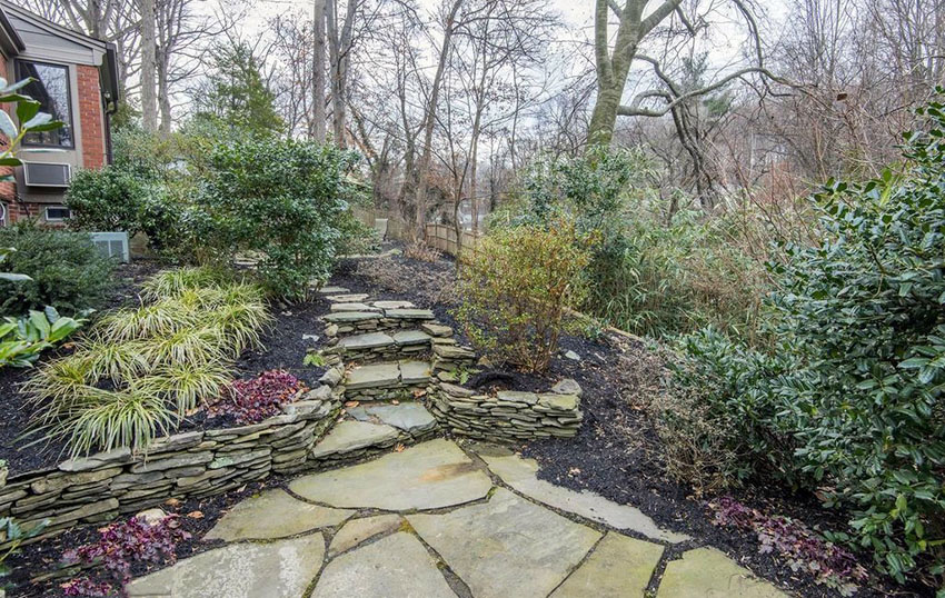 Budget flagstone walkway through hillside garden
