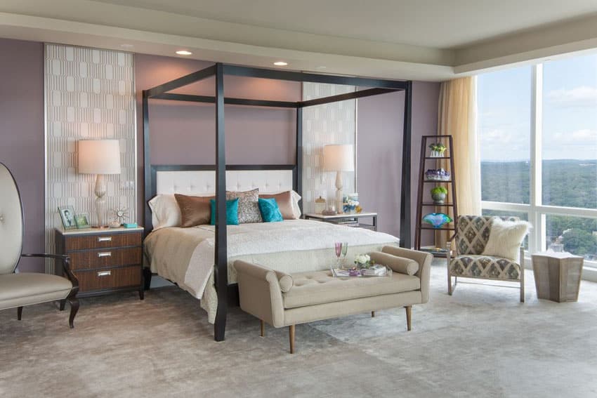Contemporary bedroom with purple painted walls with cream accent detail panels and modern four post canopy bed