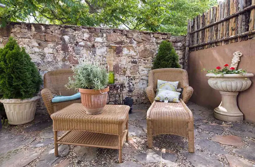 Flagstone patio with wicker furniture