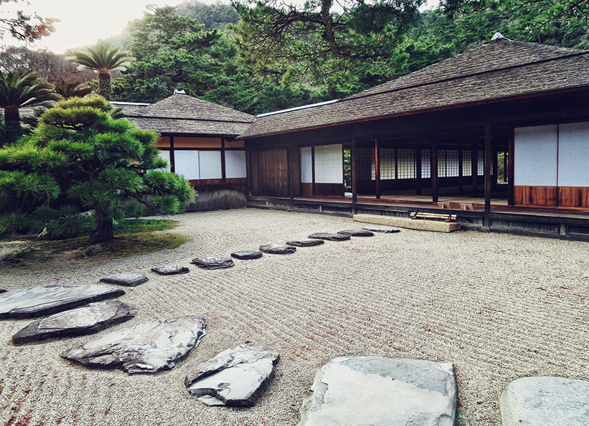 Japanese garden with large flat stone pathway
