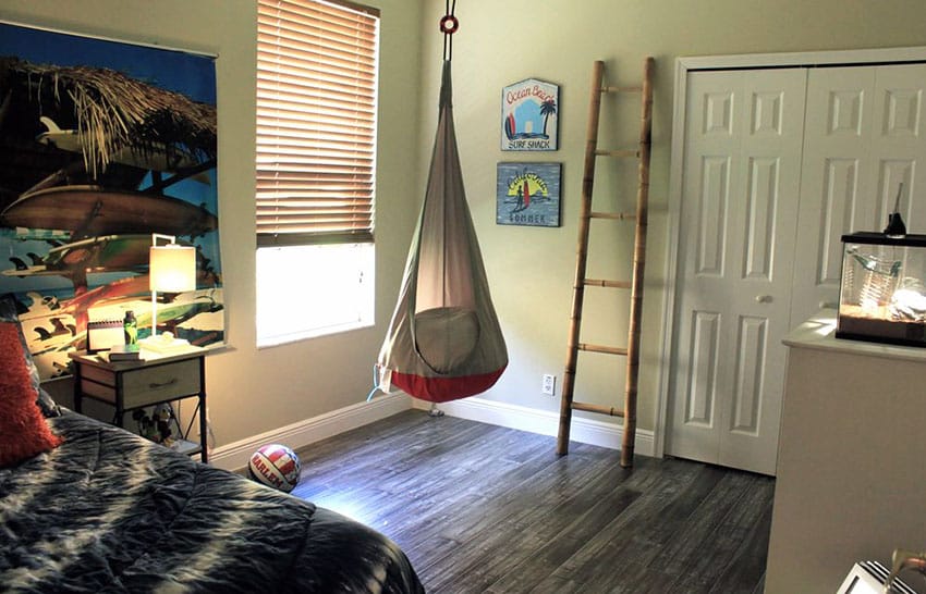 Kids bedroom with hanging nest chair