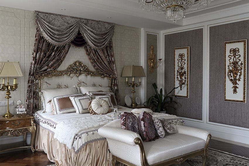 Luxury french provincial room with gold gilded furniture and purple panels and decor on walls