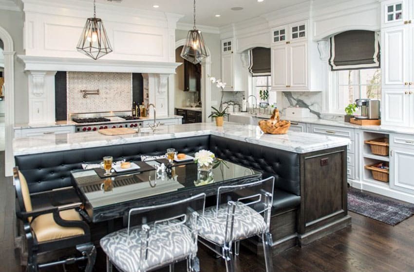 Luxury marble kitchen with l shaped island with built in leather bench