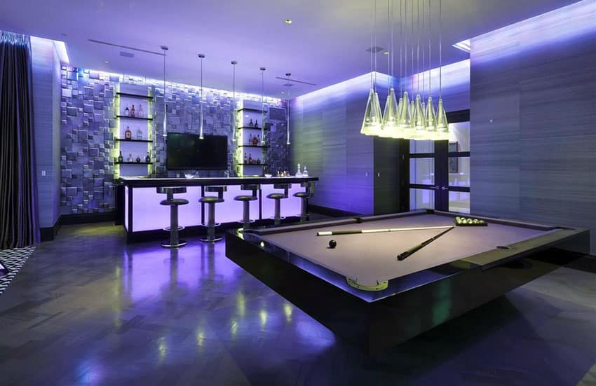 Modern basement game room with mood lighting and pool table