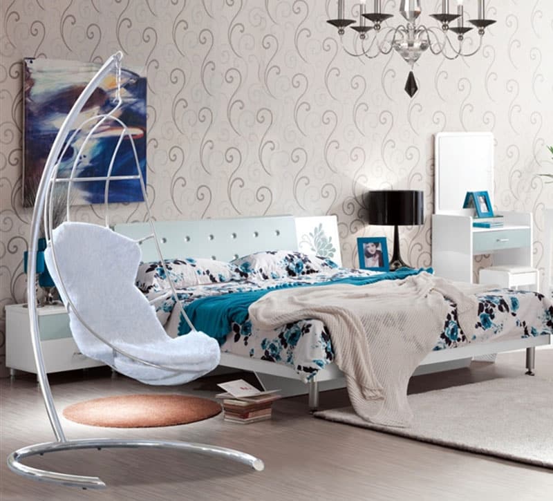 Moon shaped swinging chair in modern bedroom
