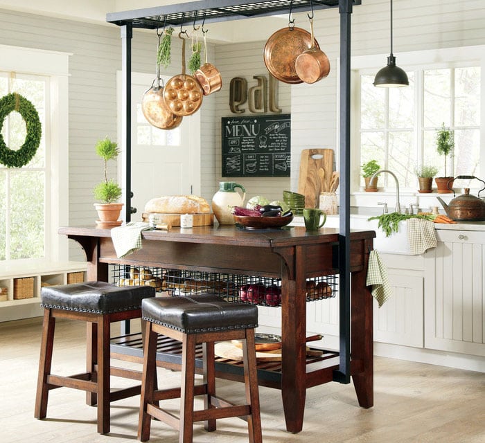 Portable wood kitchen island with two benches and overhead pot rack