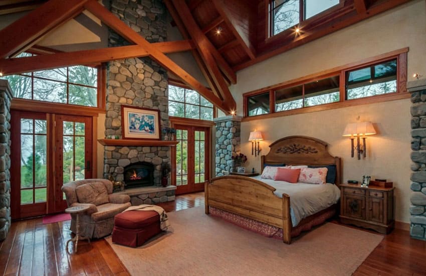Rustic master bedroom with fireplace