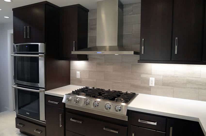 Kitchen with honed marble backsplash