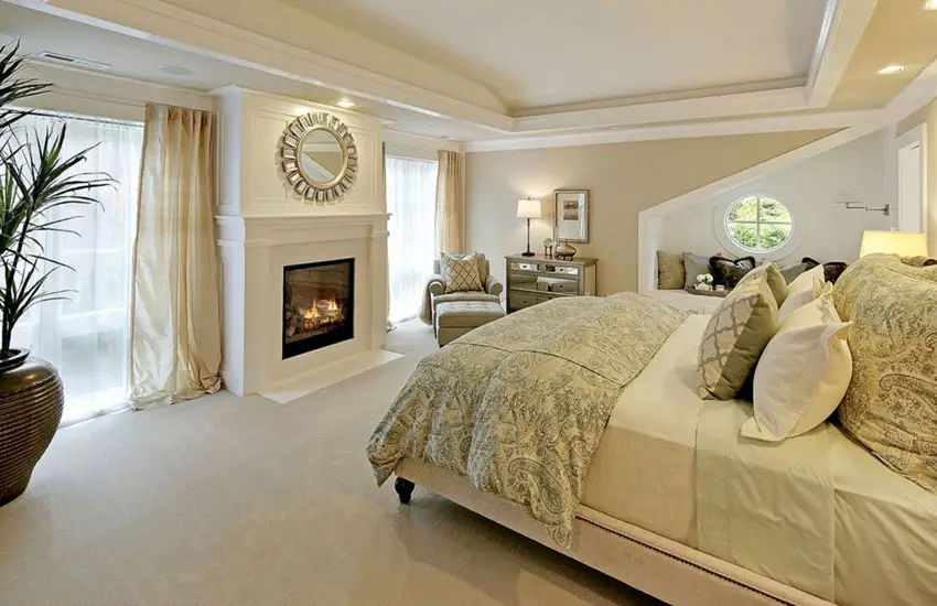 Traditional master bedroom with designer furnishings