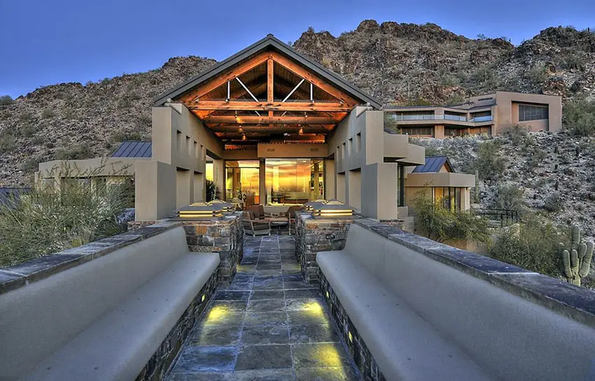 Backyard vista patio with two concrete and granite topped benches