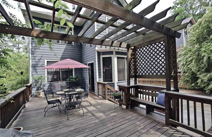 Deck with wood pergola trellis and bench