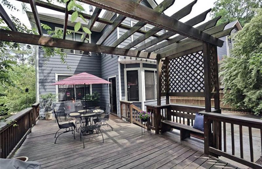 Deck with wood trellis, lattice design and bench