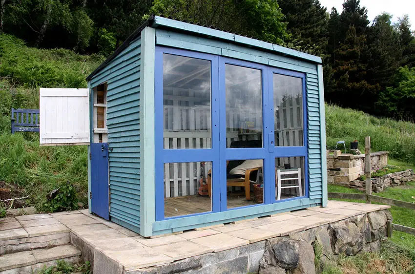 Blue wooden shed