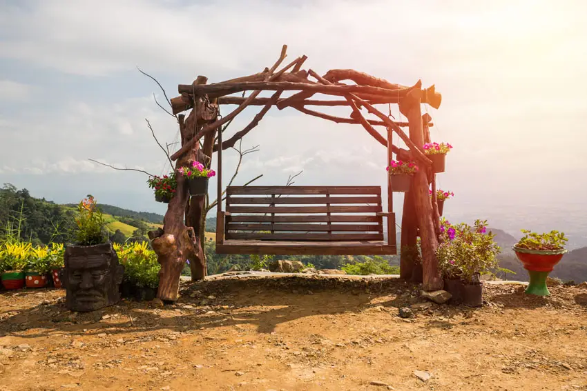 Driftwood design bench on hill