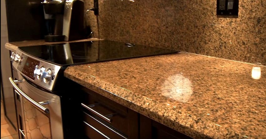 Granite counter with matching backsplash