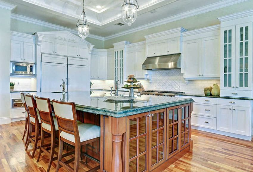 Kitchen with Brazilian green granite counter island and mint green paint color