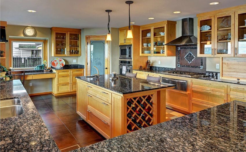 Kitchen with glass door cabinets and baltic brown granite countertop