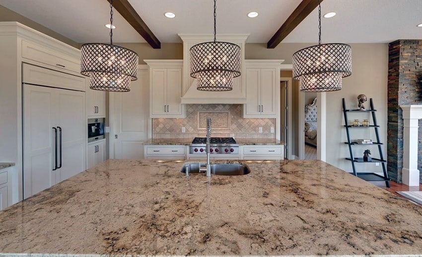 Kitchen with lapidus granite island and white cabinetry