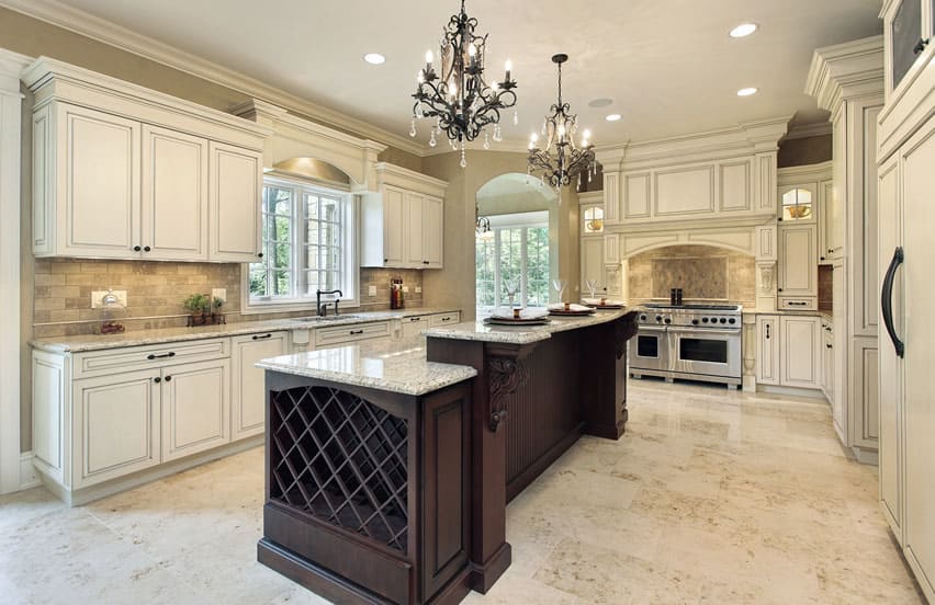 Kitchen with white cabinets and white granite countertop