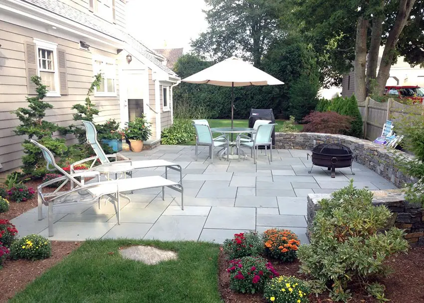 Marble stone patio with portable metal firepit
