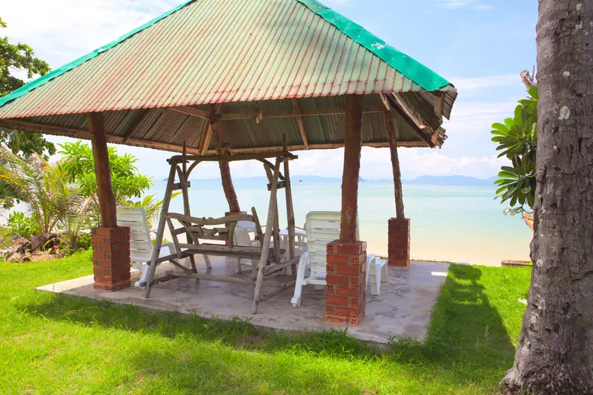 Oceanview swinging bench under palapa