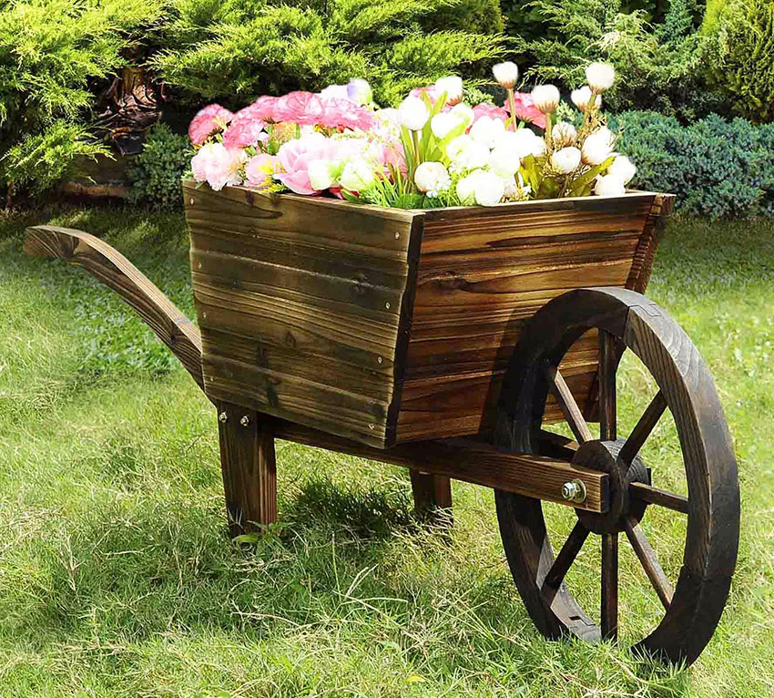 Rustic wood wheelbarrow planter decoration