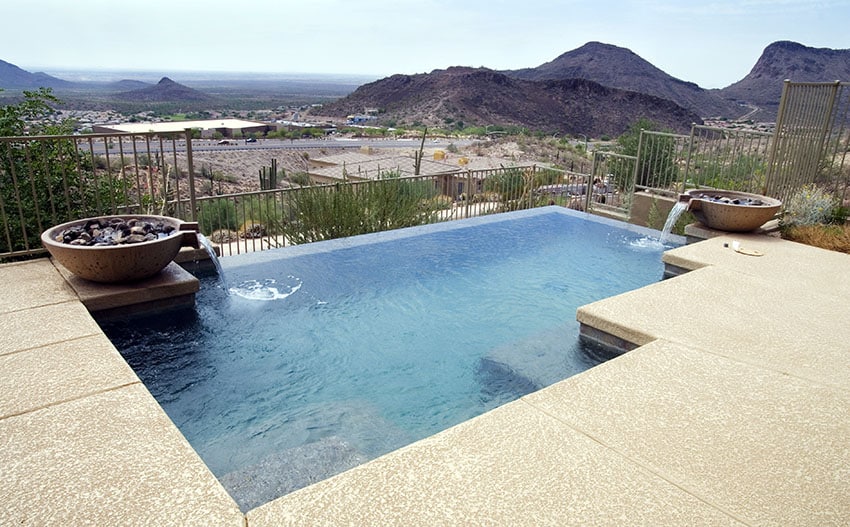 Pool set against a mountain backdrop