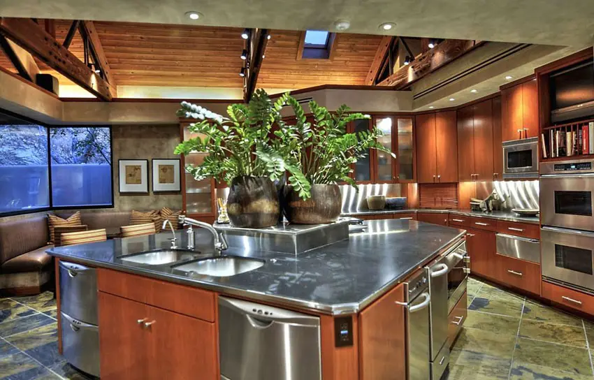 Kitchen with large stainless surface island 