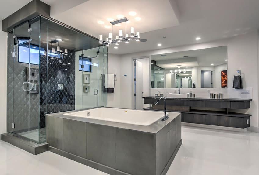 Contemporary master bathroom with dark tile walk-in shower and enclosed bathtub