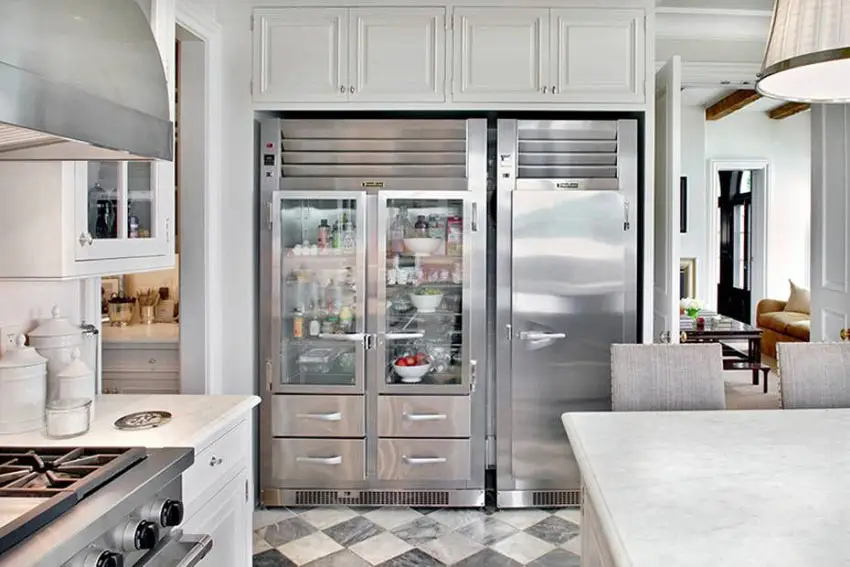 Gourmet kitchen with side by side freezer fridge