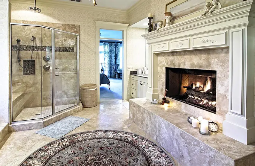 Bathroom with glass style shower with bench and fireplace