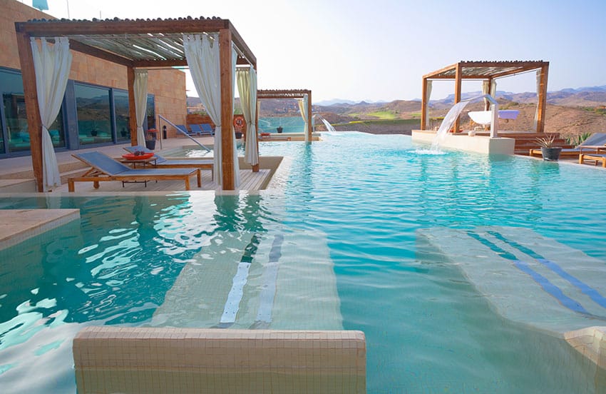Luxury pool cabana lounge area inside swimming pool