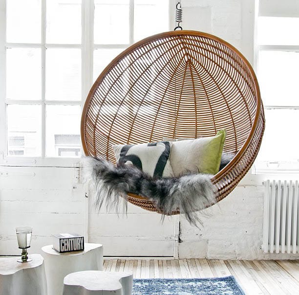Round wicker hanging chair with comfy faux fur
