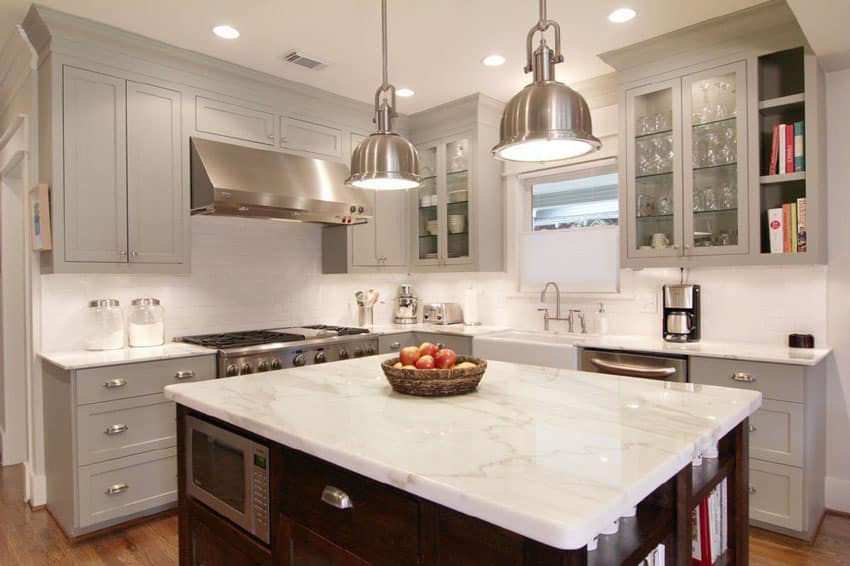 traditional-l-shaped-kitchen-with-gray-cabinets-white-marble-countertops-and-island